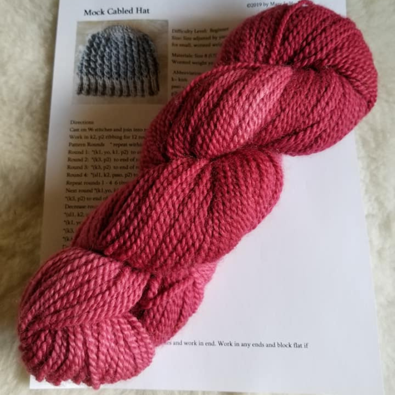 knitted hat kit with red worsted romney yarn